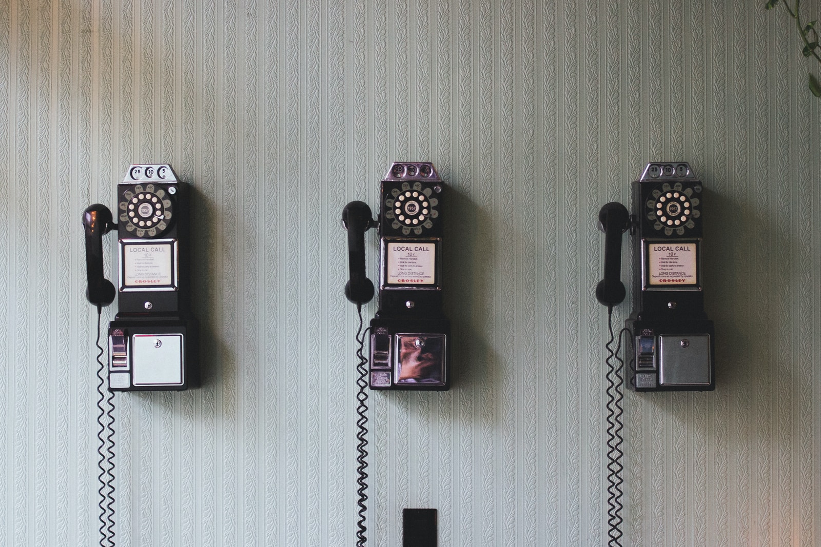 Photo by Pavan Trikutam minimalist photography of three crank phones
